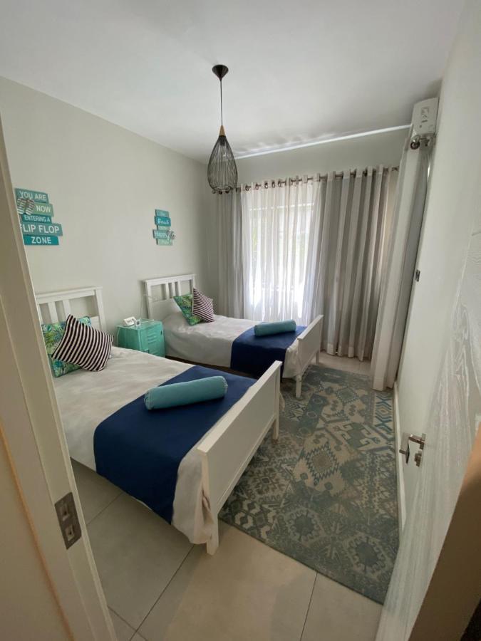 Beachcove Apartment 2 Pereybere Beach ภายนอก รูปภาพ